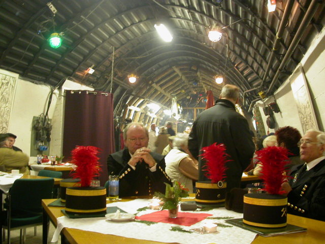 Four miners' hats on a table !